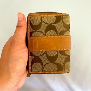 Fairly used Brown and tan Coach Wallet